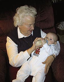 Grandmother Julee feeds Samuel, 29 January 2001