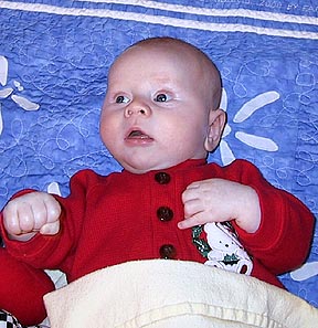 "I'm getting bigger or this Santa outfit's getting smaller!"