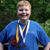 Samuel with all his medals from 2012 Science Olympiad