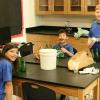 Samuel, Ansley and Ty prepare for bottle music competition