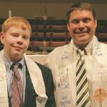 Samuel with youth pastor, Chris Moss, who led confirmation class