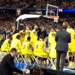 Michigan huddle during Michigan vs Syracuse game