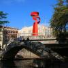 Torch of Freedom and foot bridge over San Antonio River