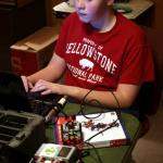 Samuel works on program for EV3 robot, January 1, 2014