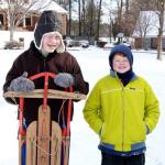 Sam and Nate prepare for morning of sledding down Livsey School hill