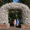Samuel and Julia under one of the many antler arches in Jackson Hole, Wyoming