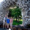 Family shot under one the famous antler arches of Jackson Hole, WY