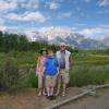 Samuel, Julia and Edgar at river landing on Snake River with Tetons in background