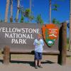 Sam at entrance to Yellowstone NP