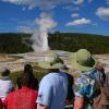 Samuel and Julia watch Old Faithful erupt