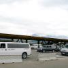 Jackson Hole Airport (JAC) with wooden terminal and Grand Tetons backdrop