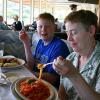 Samuel shows disdain for his dad's photography during meals, The Spinnaker, Sausalito