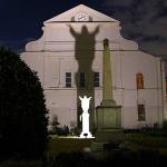 Shadow of Christ on rear wall of St. Louis Cathedral