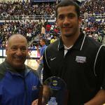 Coach Trent Miles accepts trophy for Sun Belt football team with highest GPA