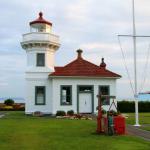 Historic Mukilteo lighthouse with ferry in background, July 6, 2014