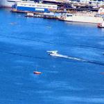 From Sky City Restaurant, watching seaplanes take off amid motorboats, sailboats, and kayaks, July 6, 2014