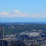 Mount Rainier and Seahawk and Mariners stadiums as seen from Sky City Restaurant atop Space Needle, July 6, 2014