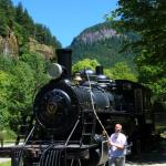 Sam rings bell on the No. 6 Seattle City Light steam locomotive that served the Newhalem community and power plant in North Cascades National Park. July 7, 2014