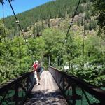 Edgar photographing Skagit River from swinging bridge in Newhalem, July 7, 2014