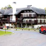 Lake McDonald Lodge with Red Jammer tour bus, July 9, 2014