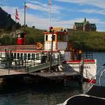 Historic MV International tour boat on Waterton Lakes with Prince of Wales Hotel in background, July 9, 2014